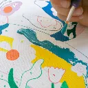 Détail de la peinture au numéro Petit Pinceau Kids Printemps avec pinceau et zones numérotées.webp