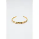 Bracelet jonc en acier inoxydable doré avec perles blanches et strass.webp